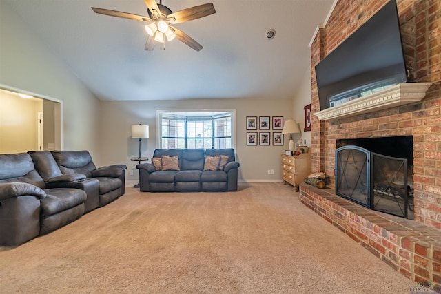 carpeted living room featuring ceiling fan, a fireplace, and lofted ceiling