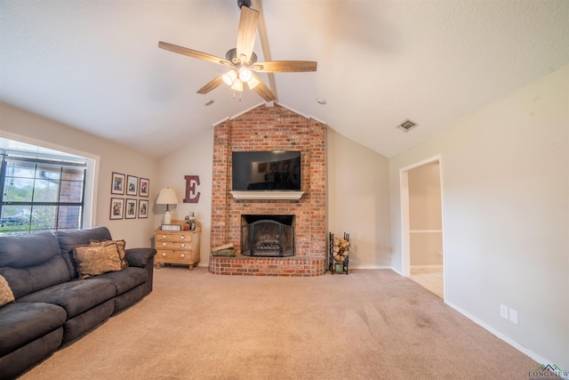 living room featuring ceiling fan, light colored carpet, lofted ceiling, and a fireplace