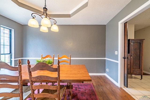 dining area with hardwood / wood-style flooring