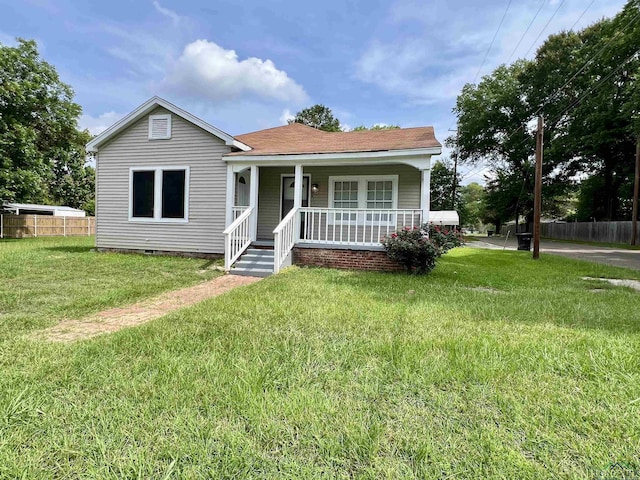 1411 E Timpson St, Longview, TX 75601 - bungalow-style house featuring a porch and crawl space