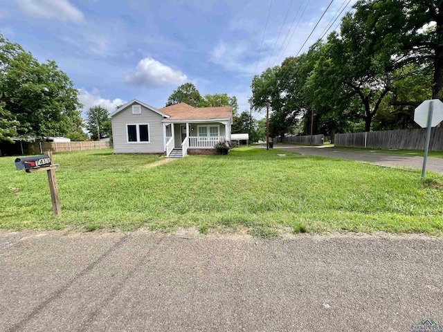 1411 E Timpson St, Longview, TX 75601 - view of front facade featuring a porch