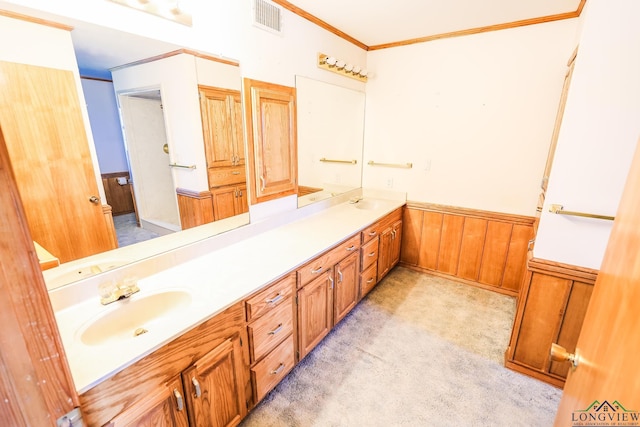 bathroom featuring vanity, wood walls, and crown molding