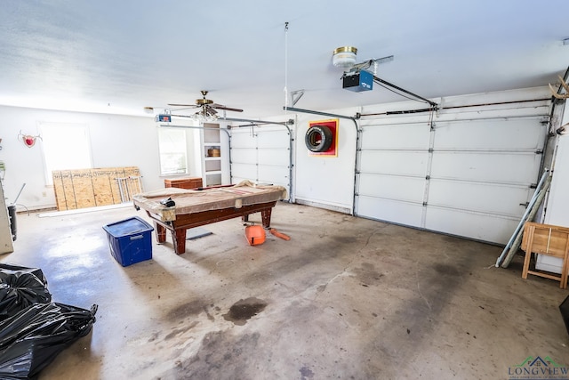 garage featuring a garage door opener and ceiling fan