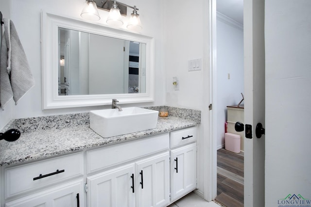 144 Hollie Cir, Sulphur Springs, TX 75482 - bathroom with ornamental molding and vanity