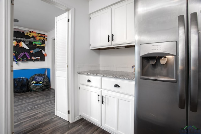 144 Hollie Cir, Sulphur Springs, TX 75482 - kitchen featuring stainless steel fridge with ice dispenser, dark wood-style floors, white cabinets, ornamental molding, and light stone counters