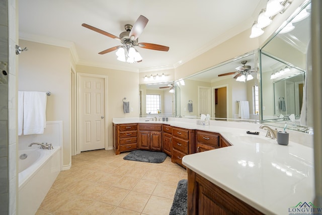 bathroom featuring ornamental molding, vanity, tile patterned floors, and a tub to relax in