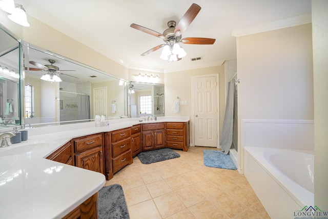 bathroom with vanity, separate shower and tub, ornamental molding, and tile patterned floors