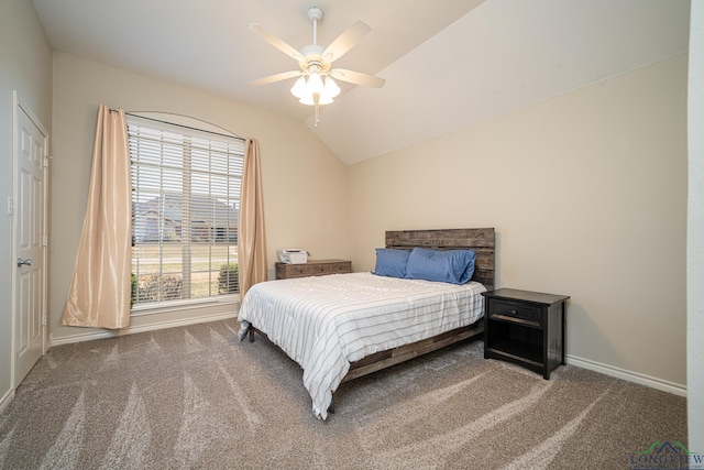 bedroom with vaulted ceiling, carpet flooring, and ceiling fan