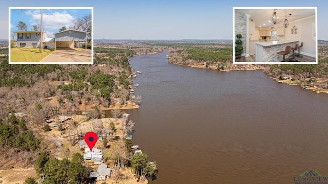 birds eye view of property featuring a water view