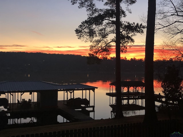 view of dock featuring a water view and boat lift