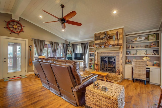 209 Rocky Point Rd, Mount Vernon, TX 75457 - living room featuring wooden ceiling, a ceiling fan, light wood-style flooring, a fireplace, and recessed lighting