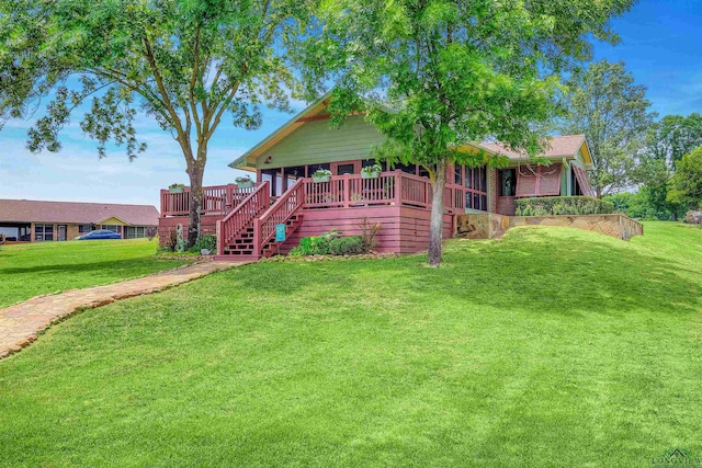 209 Rocky Point Rd, Mount Vernon, TX 75457 - rear view of house featuring a yard, a deck, and stairway