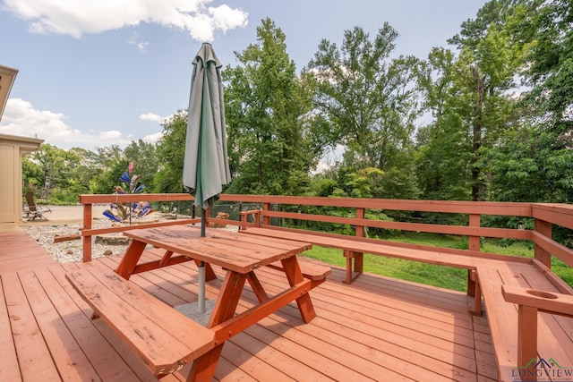 deck featuring outdoor dining area