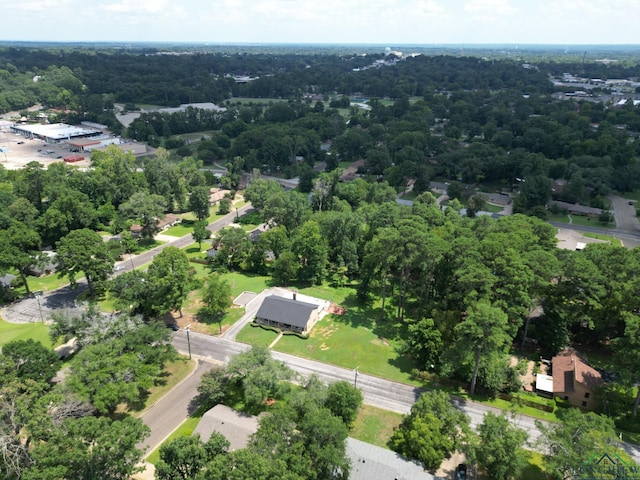 bird's eye view featuring a view of trees