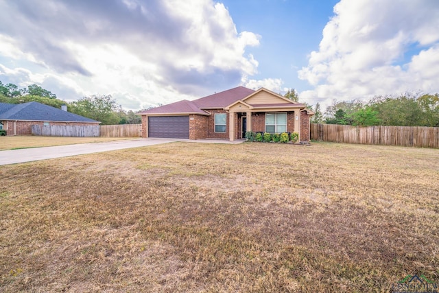 ranch-style home with a garage and a front yard