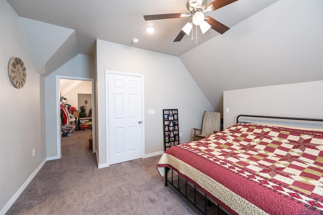 bedroom featuring ceiling fan, light carpet, and vaulted ceiling