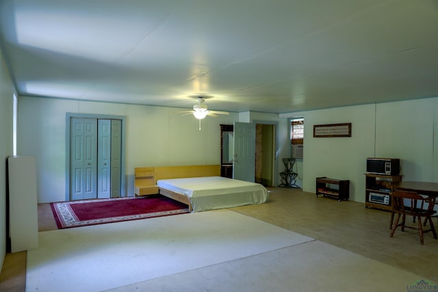 bedroom featuring ceiling fan and pool table