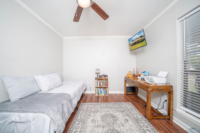 bedroom featuring crown molding, hardwood / wood-style flooring, and ceiling fan