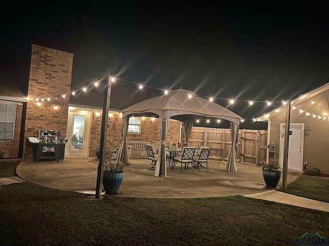 view of patio at night