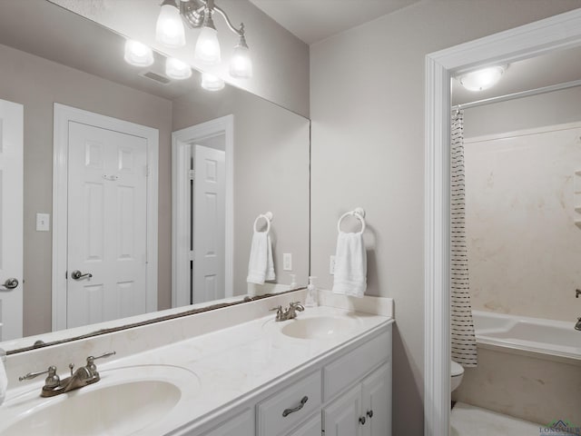 full bathroom featuring vanity, toilet, and shower / bathtub combination with curtain