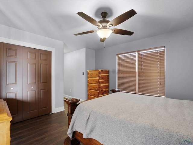 bedroom featuring dark hardwood / wood-style flooring, a closet, and ceiling fan