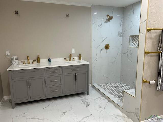 bathroom with vanity and tiled shower