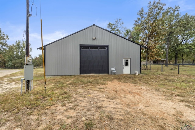 view of outdoor structure with a garage