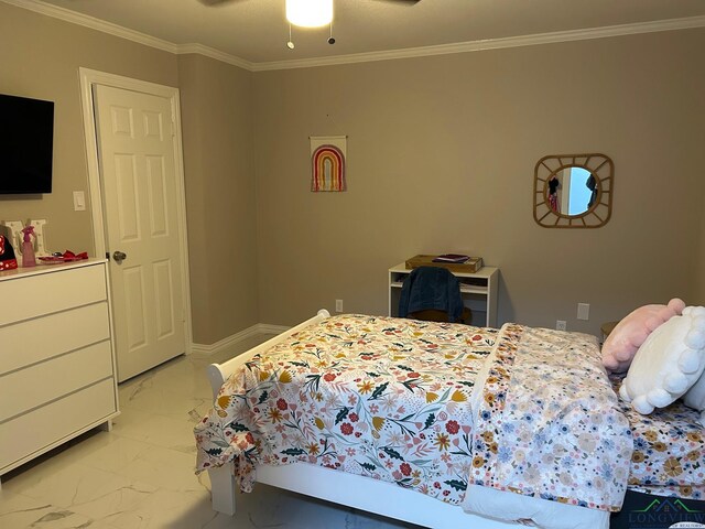 bedroom with ceiling fan and crown molding