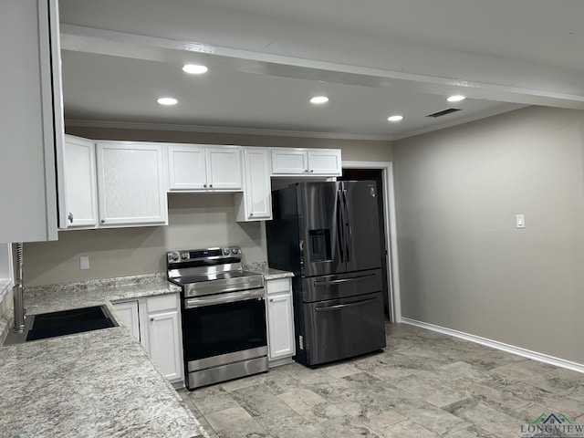 kitchen featuring appliances with stainless steel finishes, white cabinetry, crown molding, and sink