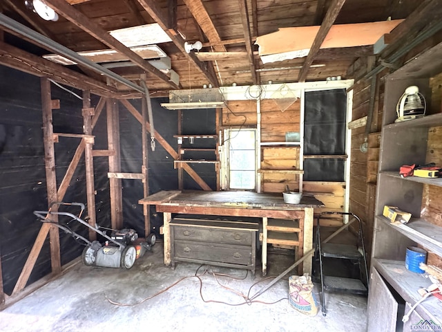 713 Martha Dr, Gladewater, TX 75647 - miscellaneous room with unfinished concrete flooring