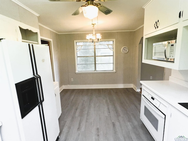 713 Martha Dr, Gladewater, TX 75647 - kitchen with white appliances, ornamental molding, dark wood finished floors, ceiling fan, and light countertops