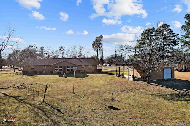 view of yard with a garage