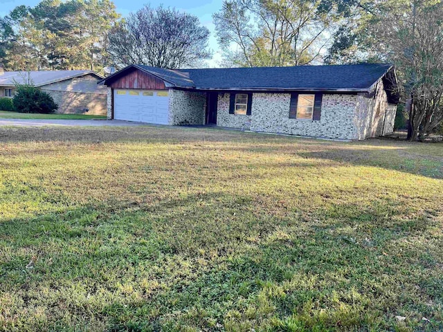 ranch-style home with a garage and a front lawn