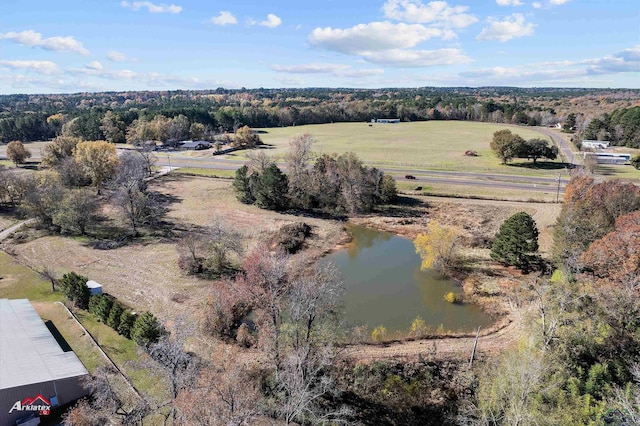 birds eye view of property with a rural view and a water view