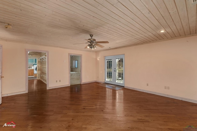 spare room with a wealth of natural light, french doors, ceiling fan, and dark wood-type flooring