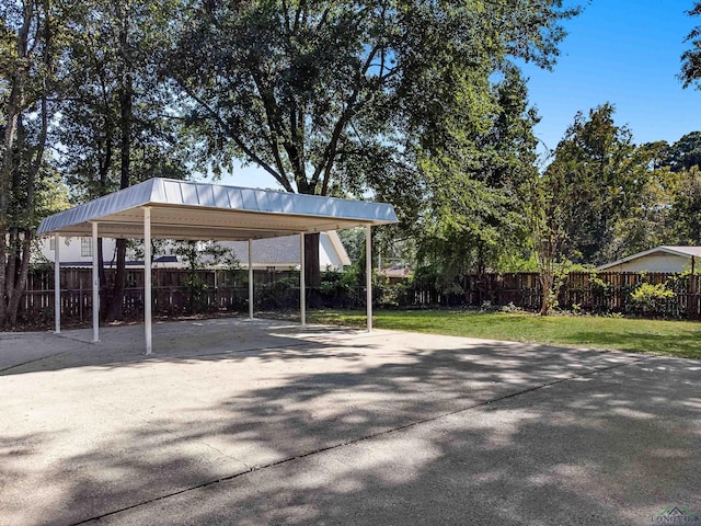 view of patio / terrace featuring a carport