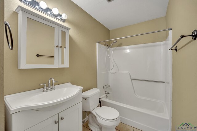 full bathroom with tile patterned floors, vanity, toilet, and bathtub / shower combination