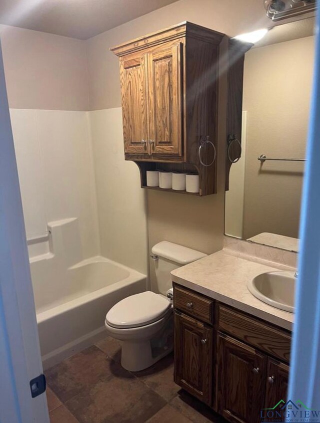 4101 Wesley St, Longview, TX 75604 - full bathroom featuring vanity, washtub / shower combination, and tile patterned flooring