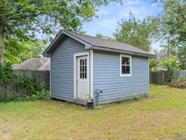 view of outdoor structure featuring a yard