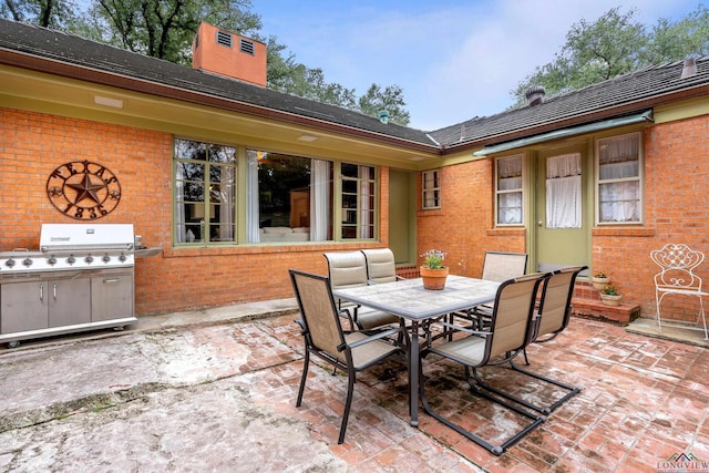 603 E Melton, Longview, TX 75602 - view of patio featuring outdoor dining area and area for grilling