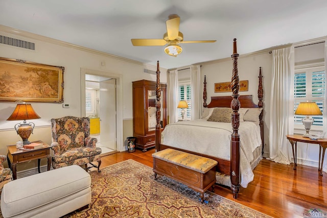 603 E Melton, Longview, TX 75602 - bedroom with wood finished floors, multiple windows, ornamental molding, and a ceiling fan