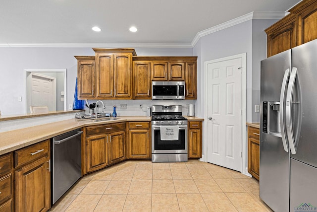 kitchen featuring sink, crown molding, decorative backsplash, light tile patterned floors, and appliances with stainless steel finishes