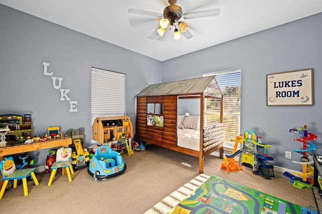 bedroom with ceiling fan and carpet