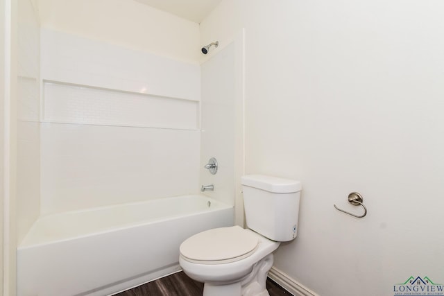 1205 Booker St, Longview, TX 75602 - bathroom with wood finished floors and bathing tub / shower combination