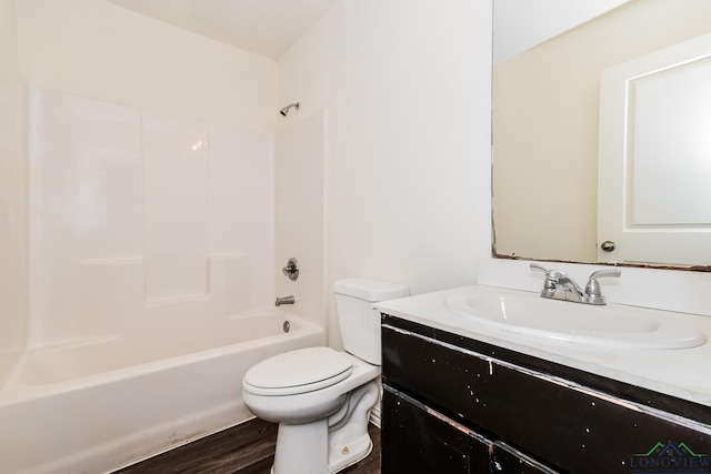 1205 Booker St, Longview, TX 75602 - full bathroom with vanity, shower / washtub combination, and wood finished floors