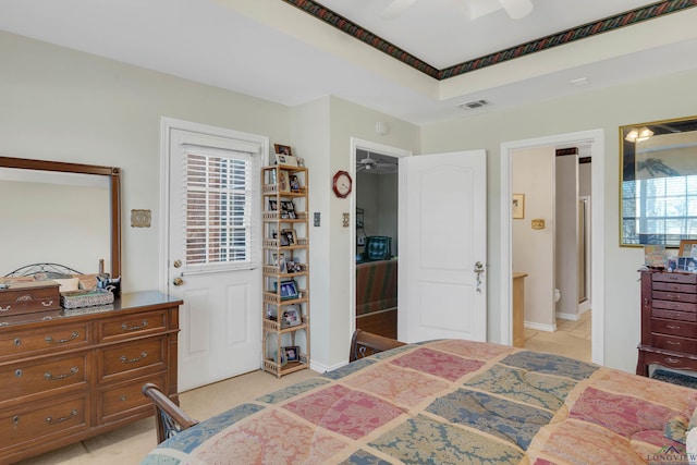 bedroom with ceiling fan and ensuite bathroom