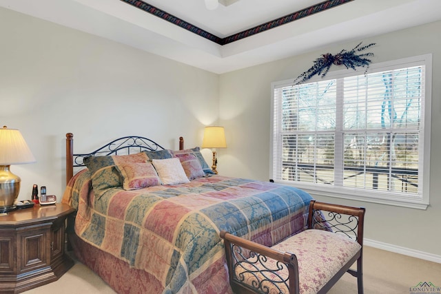 bedroom with carpet flooring and multiple windows