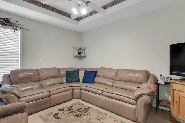 living room with ceiling fan and light carpet