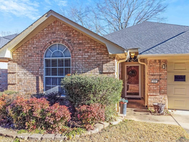 entrance to property with a garage