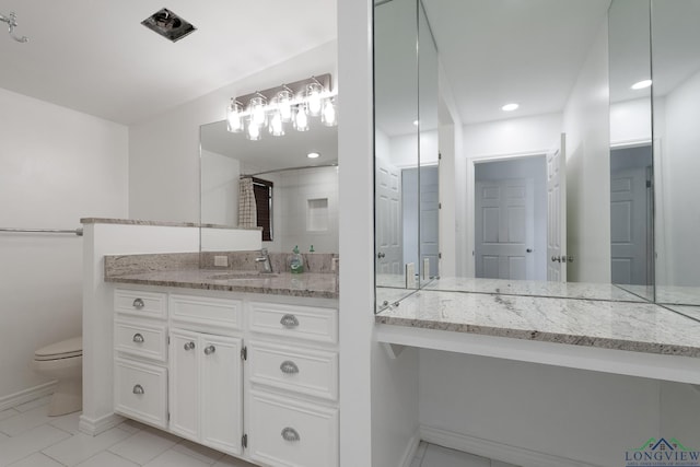 809 Turner Ln, Tuscola, TX 79562 - full bath with vanity, toilet, baseboards, tile patterned floors, and a shower